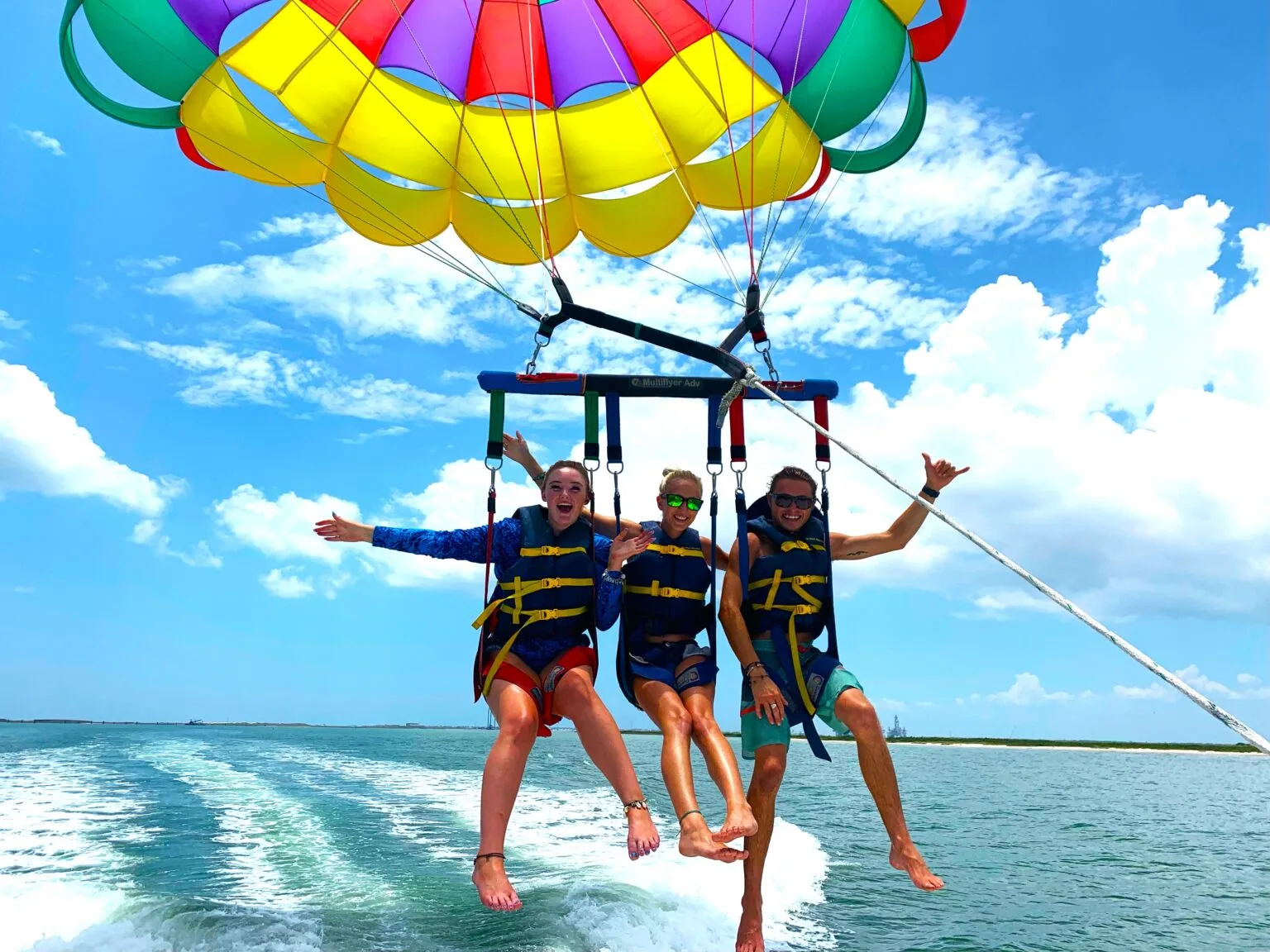 Girls having fun flying with us in Parasailing 