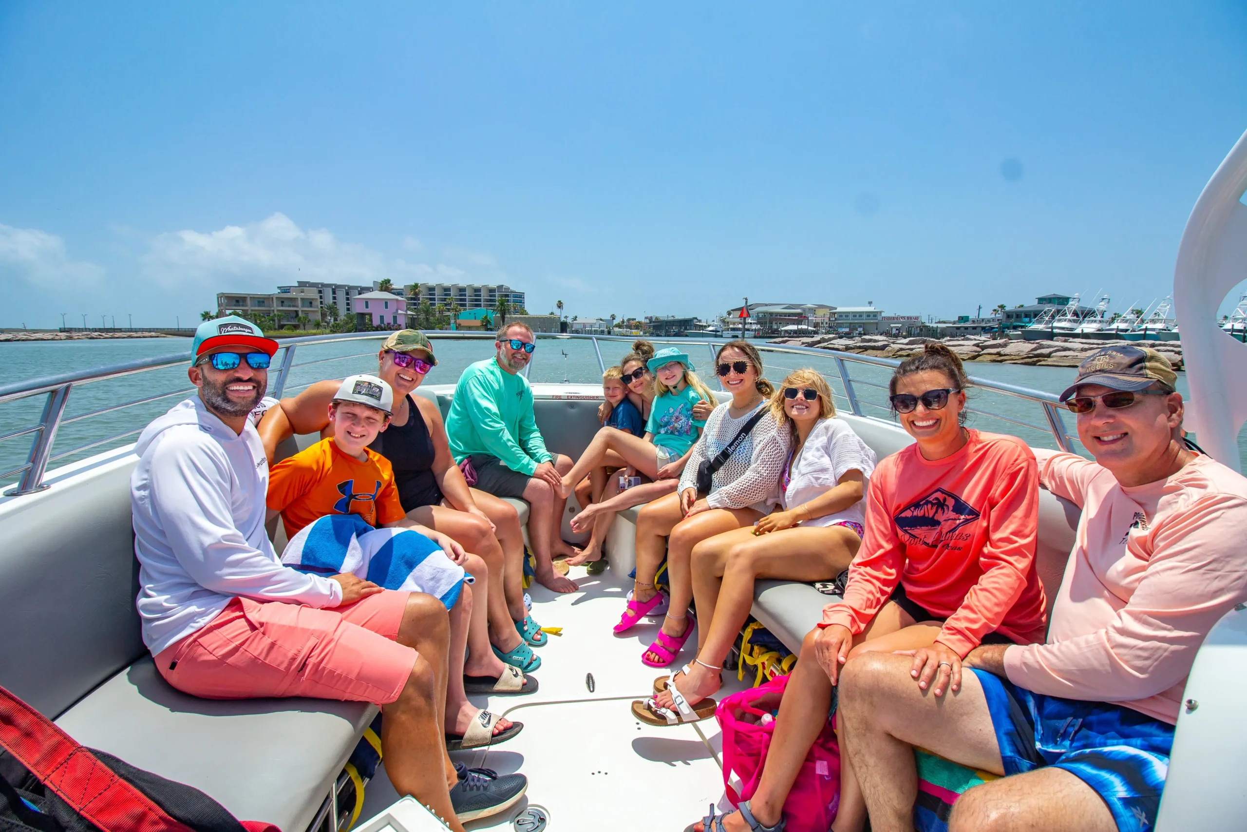 Large group of people going to enjoy an afternoon of Parasailing.